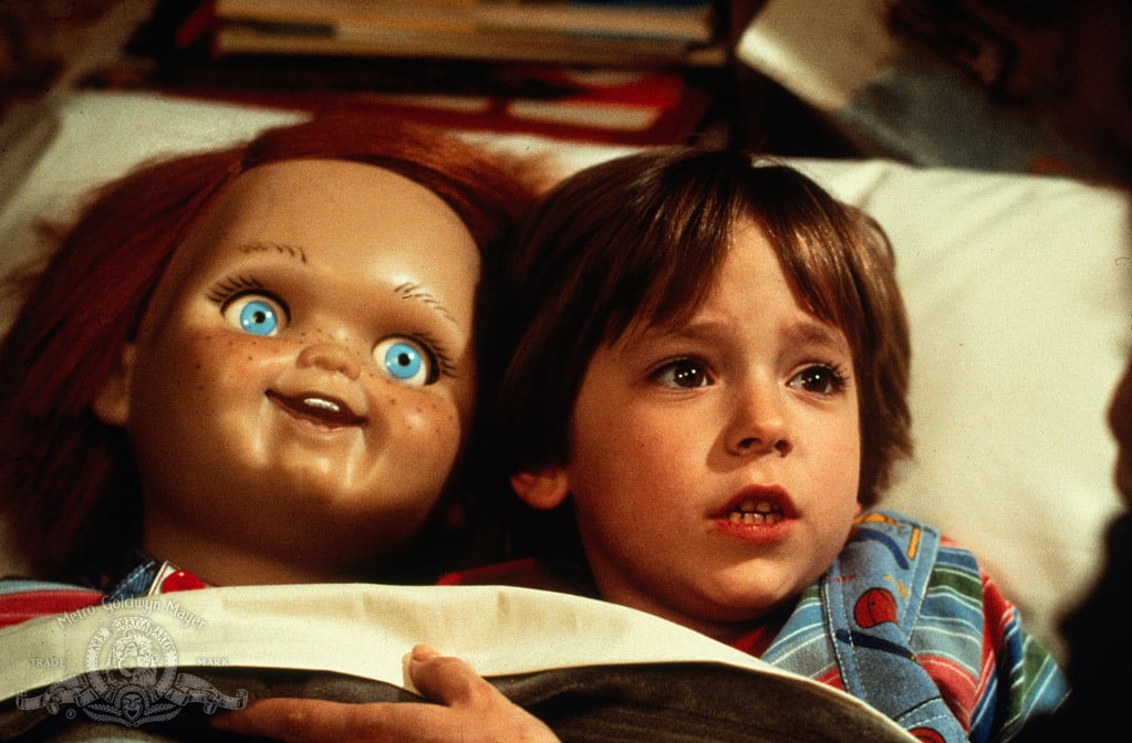 Child's Play's Andy and Chucky in bed...yeesh!