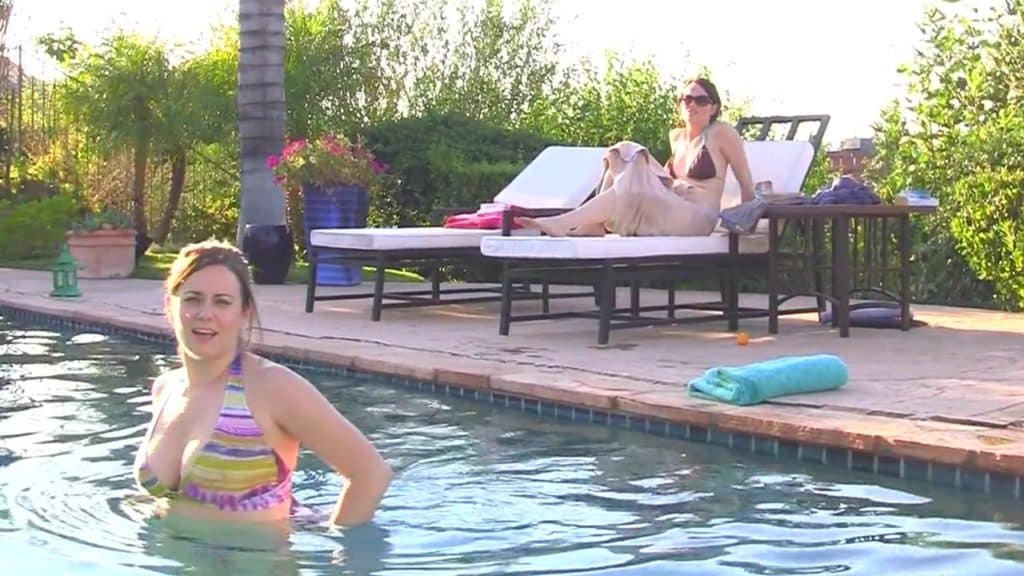 Katie and Kristi from Paranormal Activity 2 in bikinis in a pool
